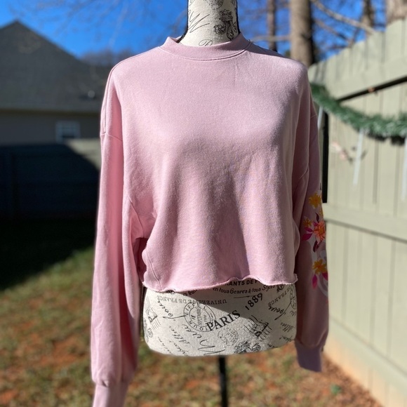 Pink Crop Sweatshirt In Pink With Flowers On The Sleeve - Picture 1 of 7
